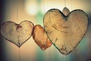 Photo of wooden hearts.