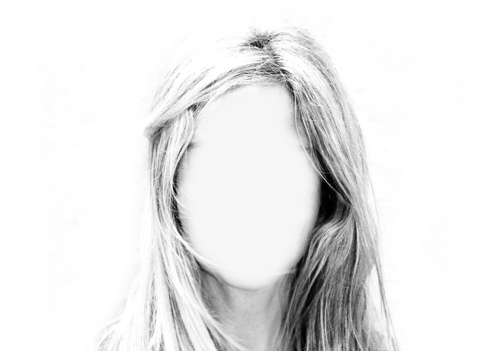 Faceless woman in black and white
